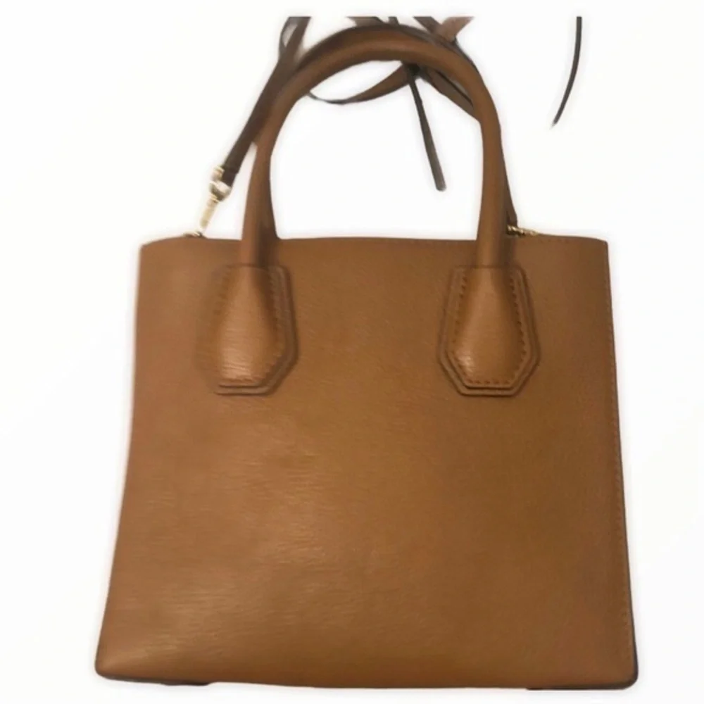 Michael Kors very gently
