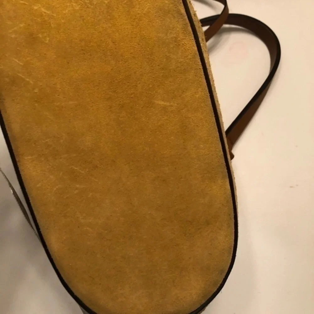 Michael Kors scuffs scratches