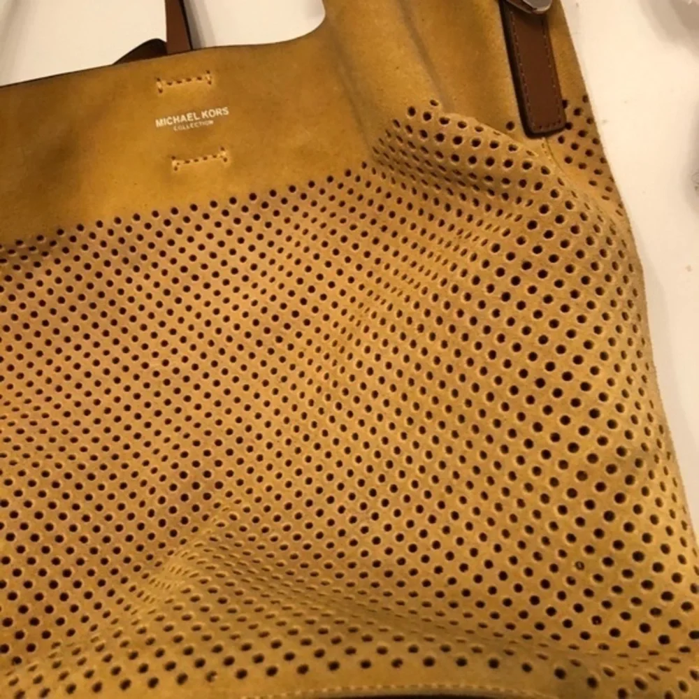 Michael Kors scuffs scratches