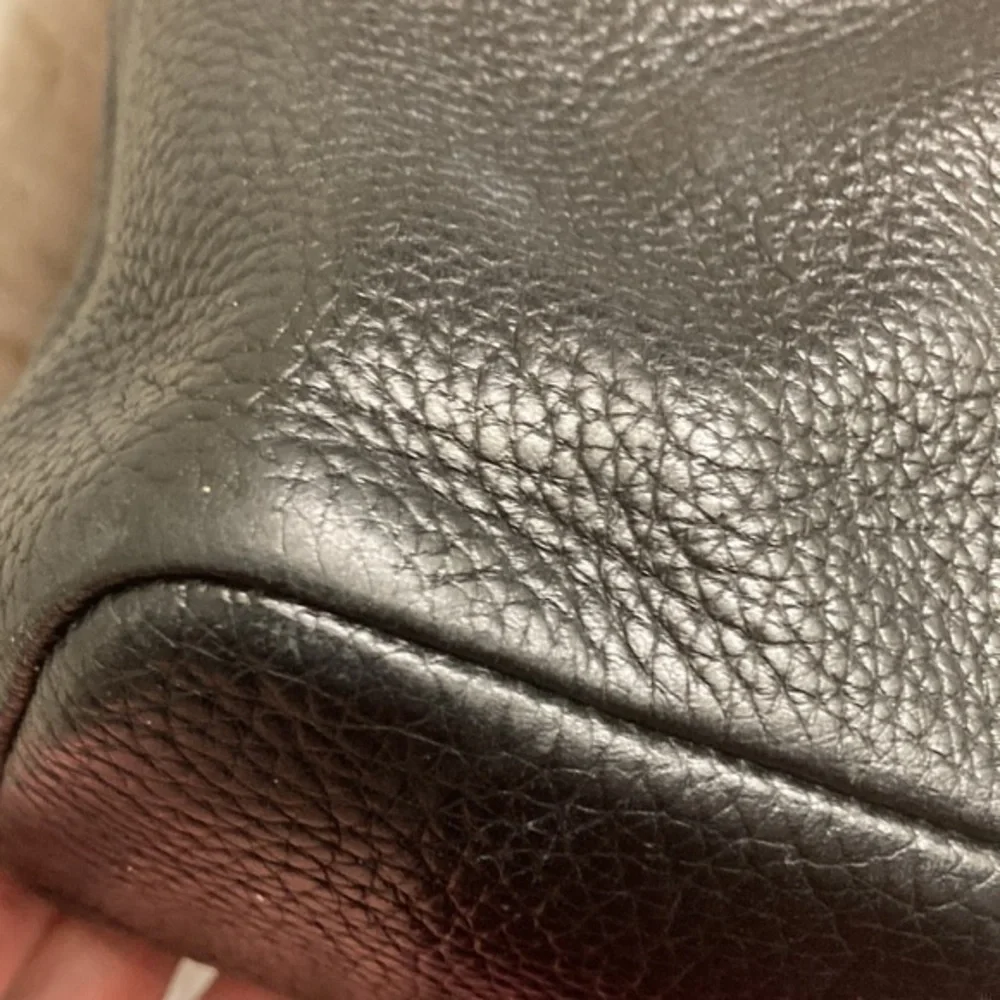 Michael Kors indentations scuffs