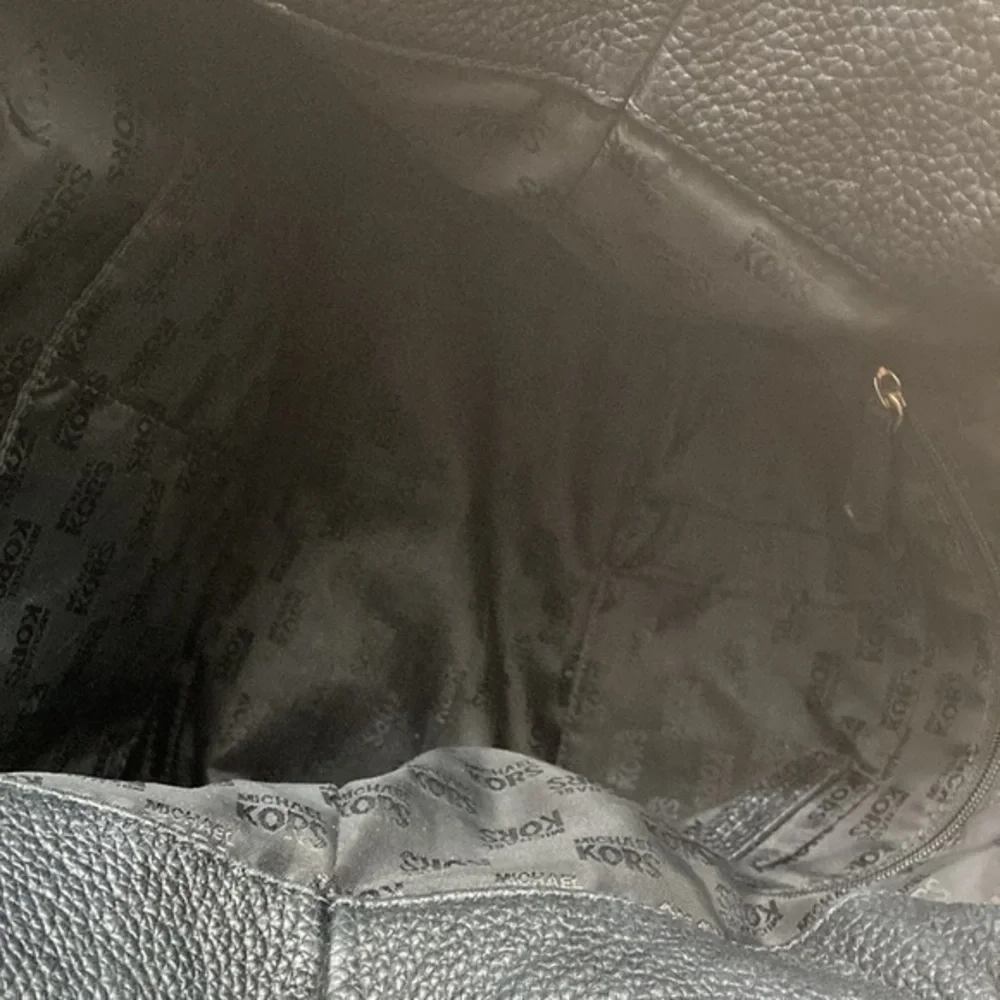 Michael Kors indentations scuffs
