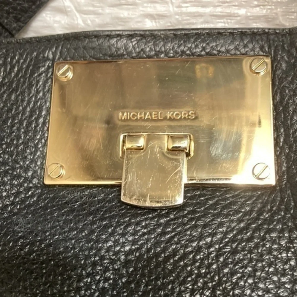 Michael Kors indentations scuffs