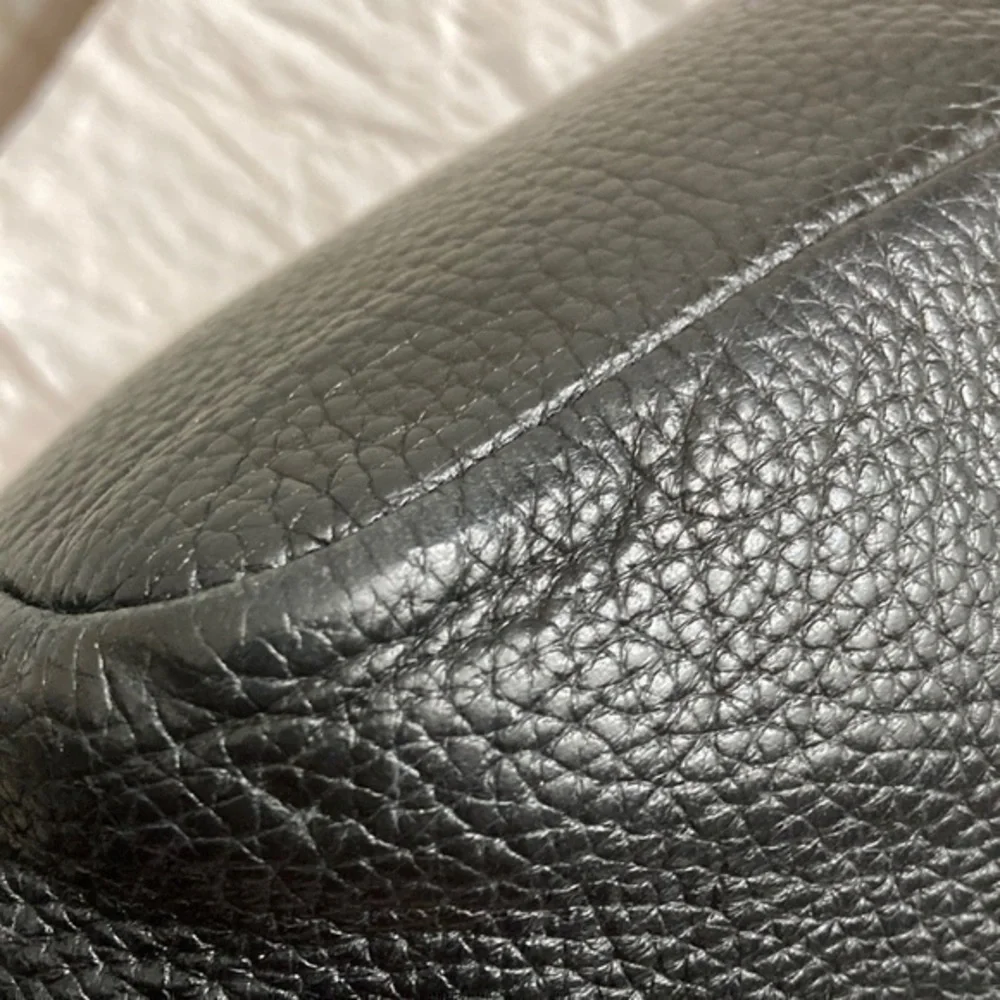 Michael Kors indentations scuffs