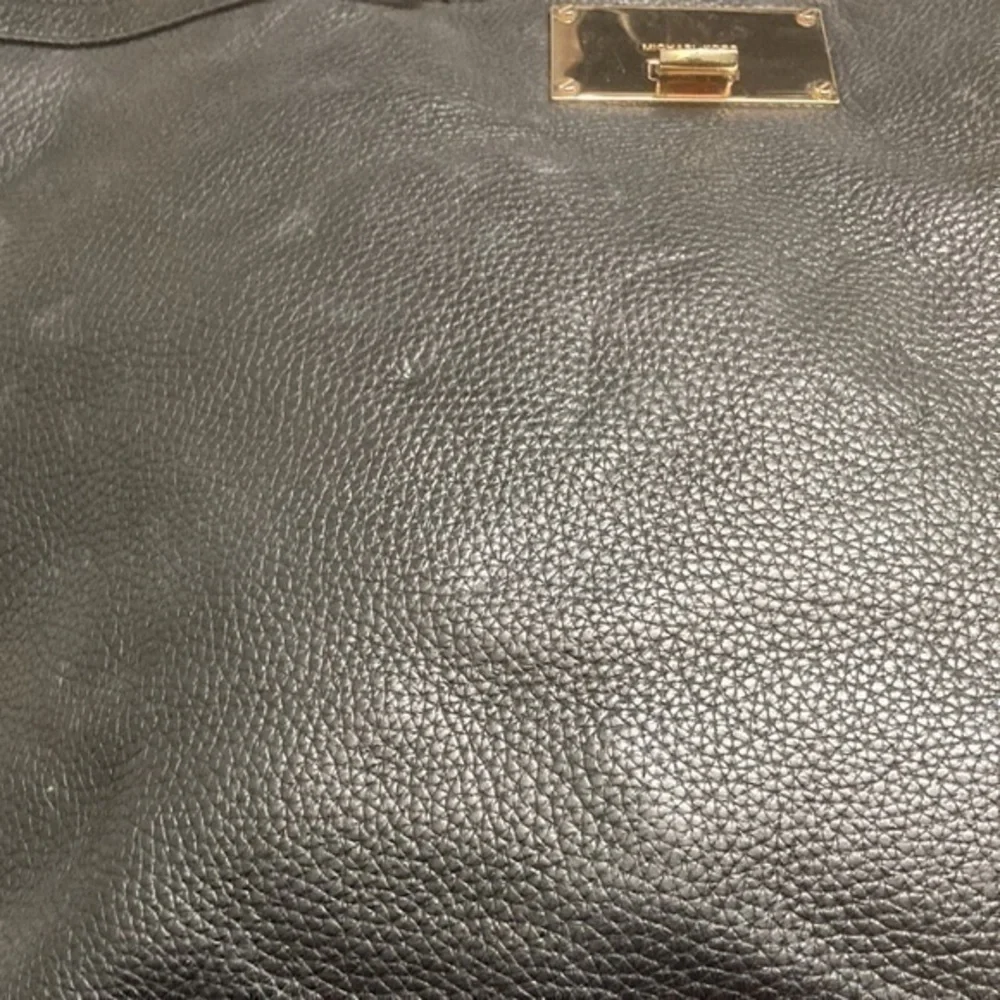 Michael Kors indentations scuffs