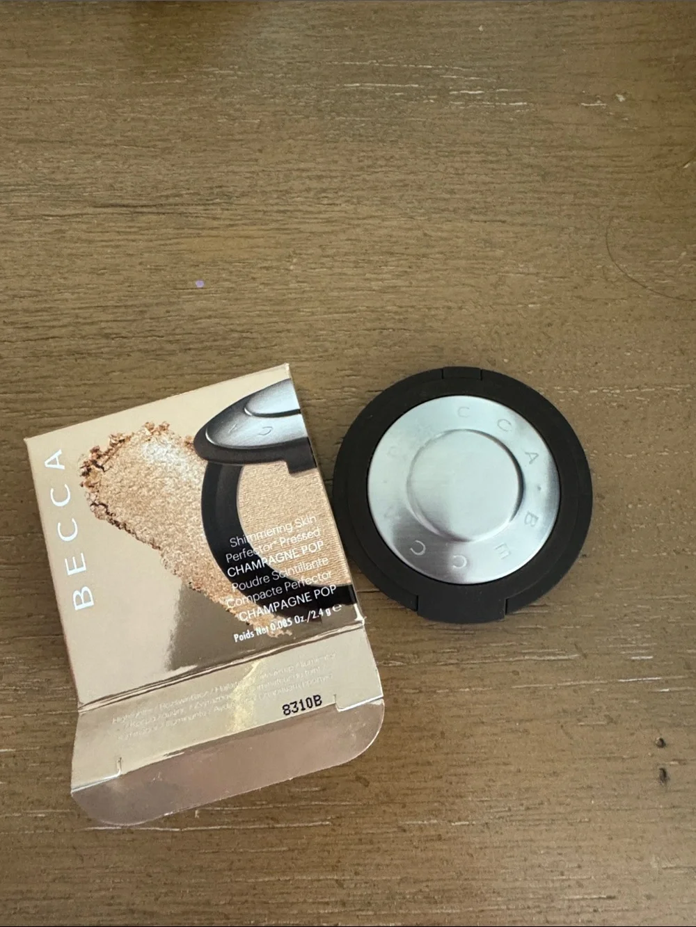 BECCA Champagne Pop Pressed Highlighter — Gold Tone