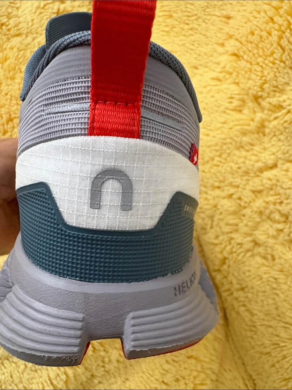 On Running Gray and Red Trail Runners