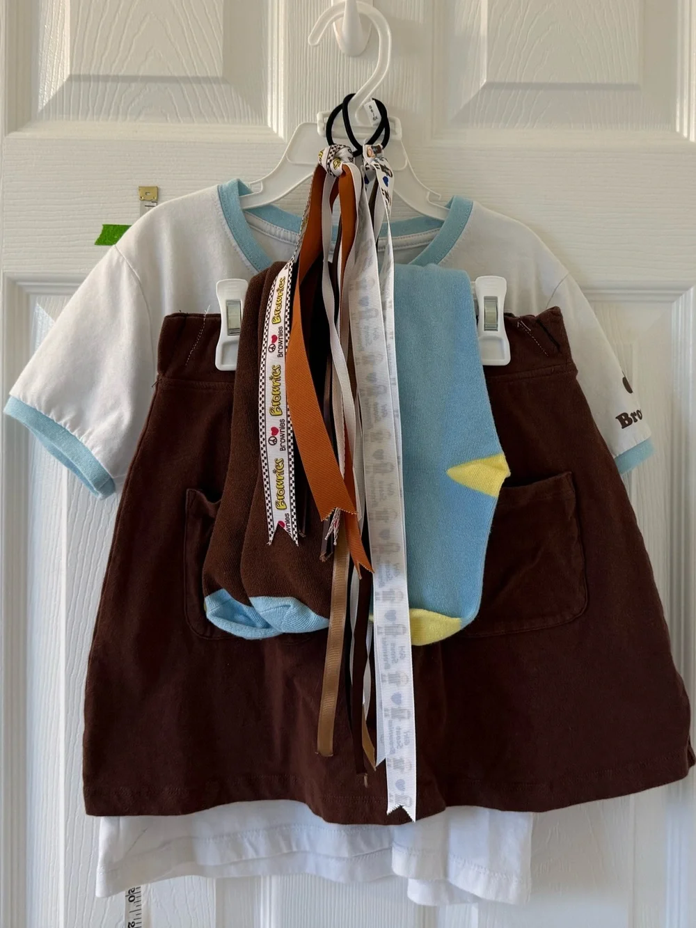 Brownie Girl Scouts Uniform. Tee shirt with skort and socks