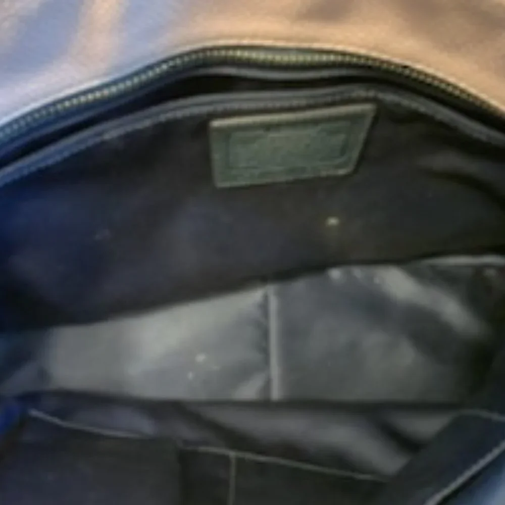 Coach used excellent