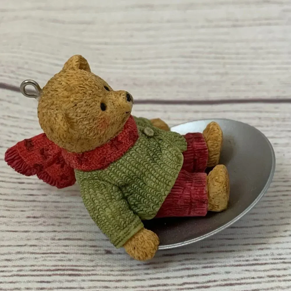 Hallmark christmas sledding ornament