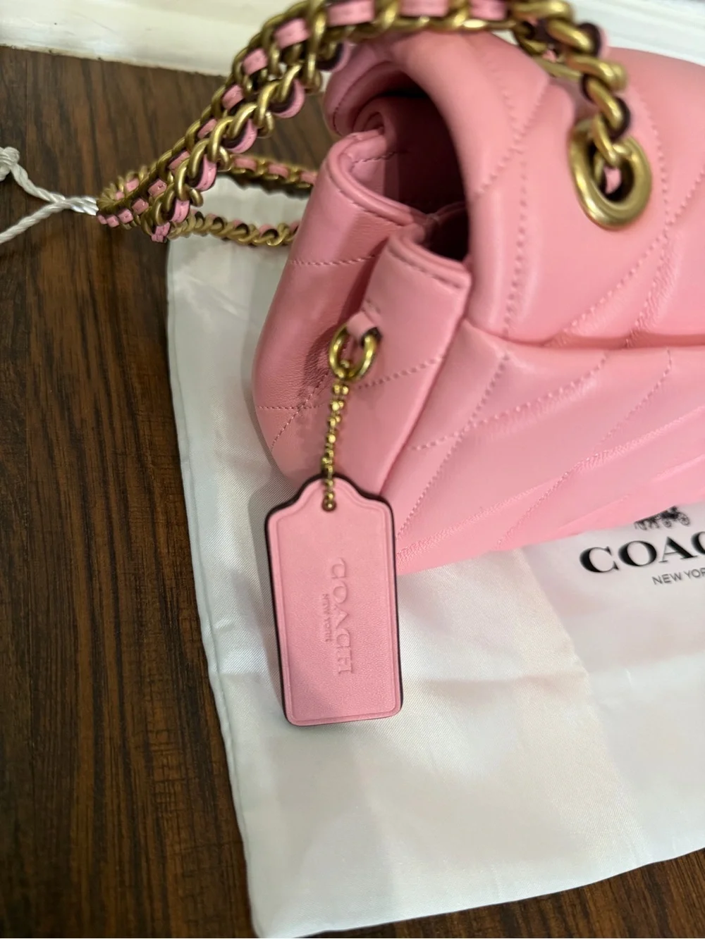 Coach soft pink