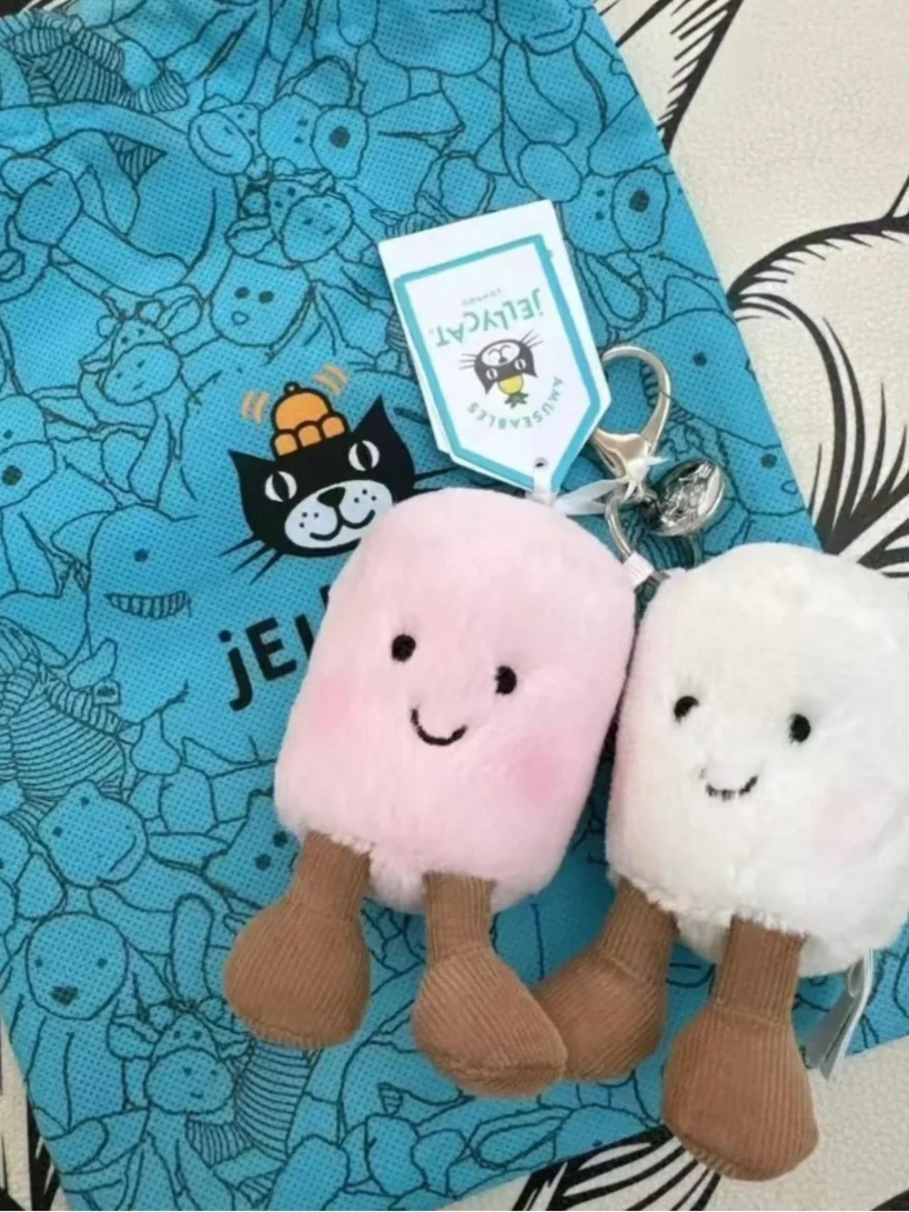 Jellycat Pink and White Plush Popsicle Bag Charm Keychain with a bag
