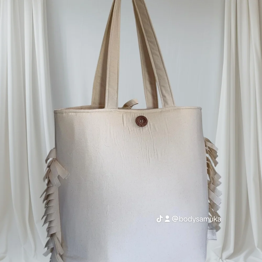 Chic Beige Tote with Fringe Detailing