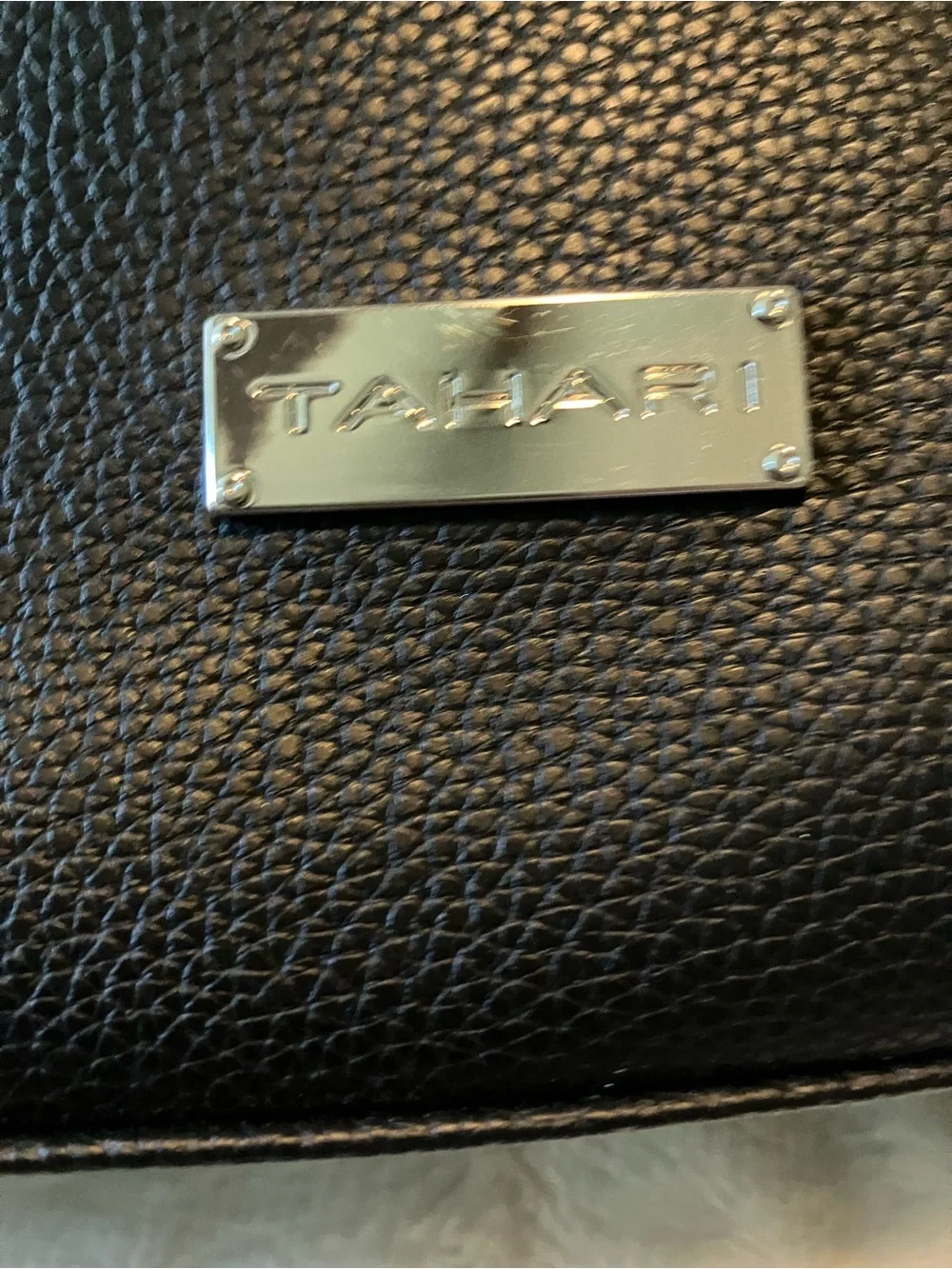 Tahari tags $109