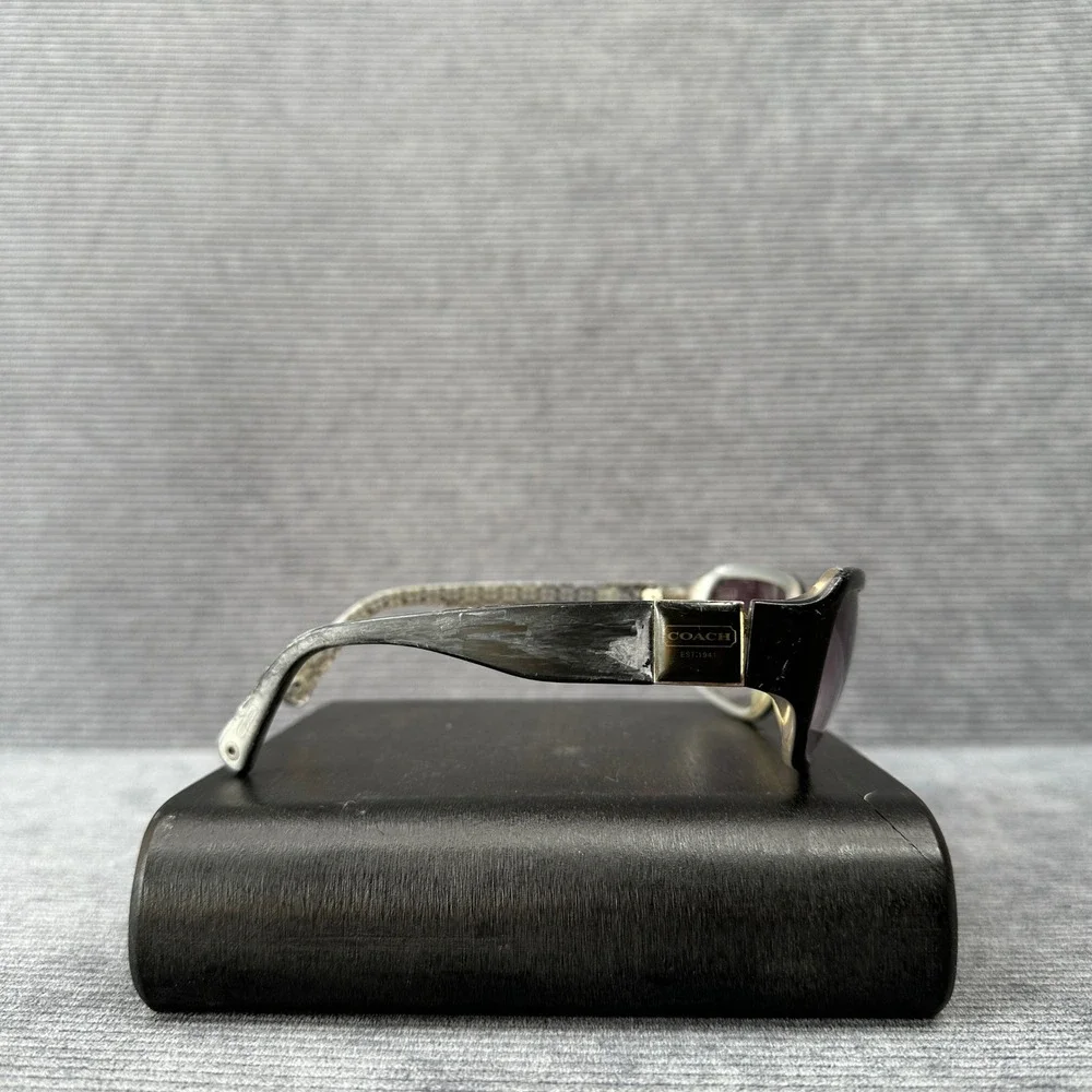 Coach sunglasses featuring