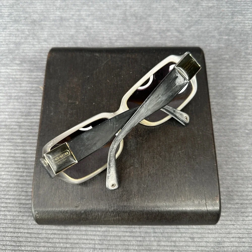 Coach sunglasses featuring