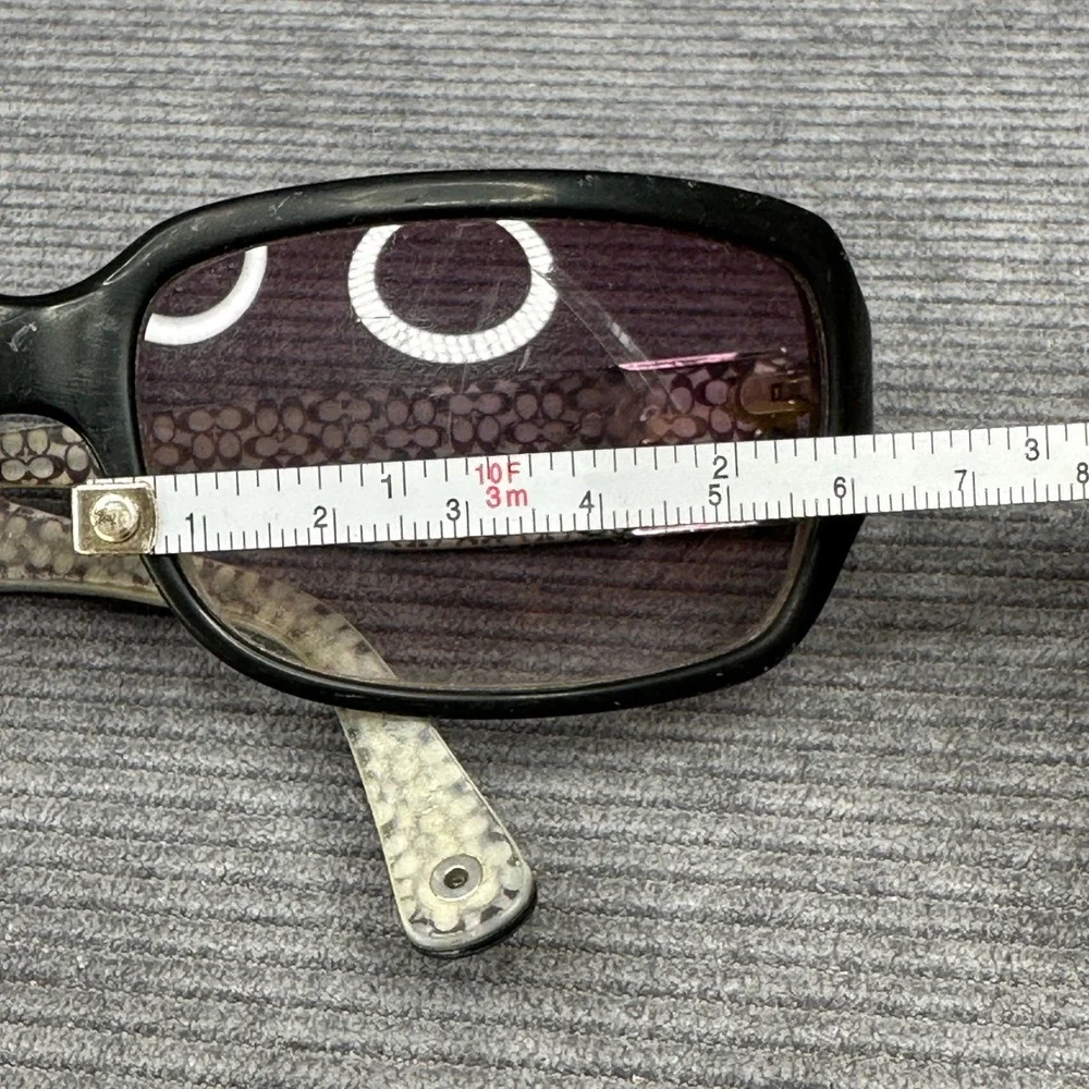 Coach sunglasses featuring