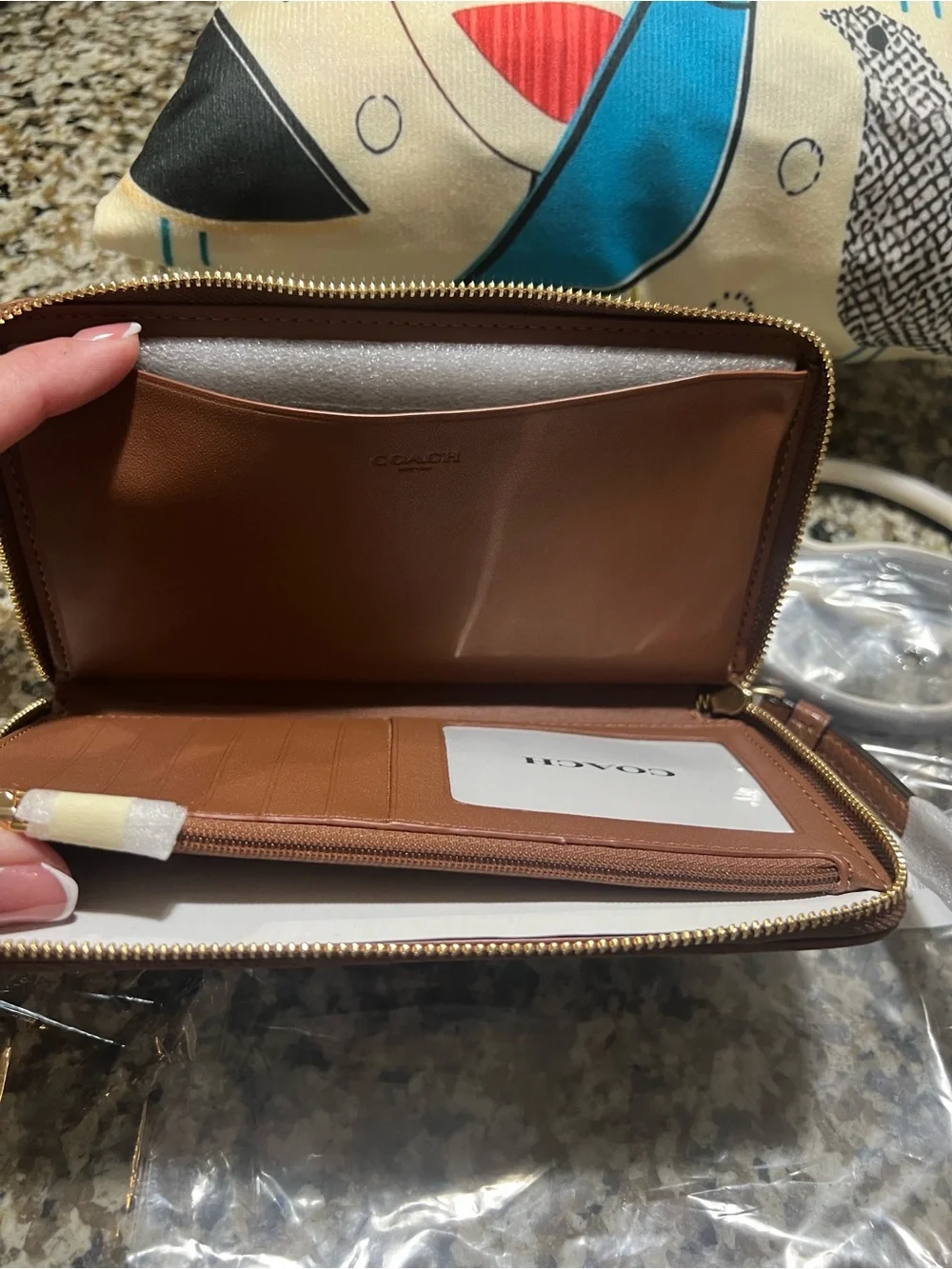 Coach iconic signature