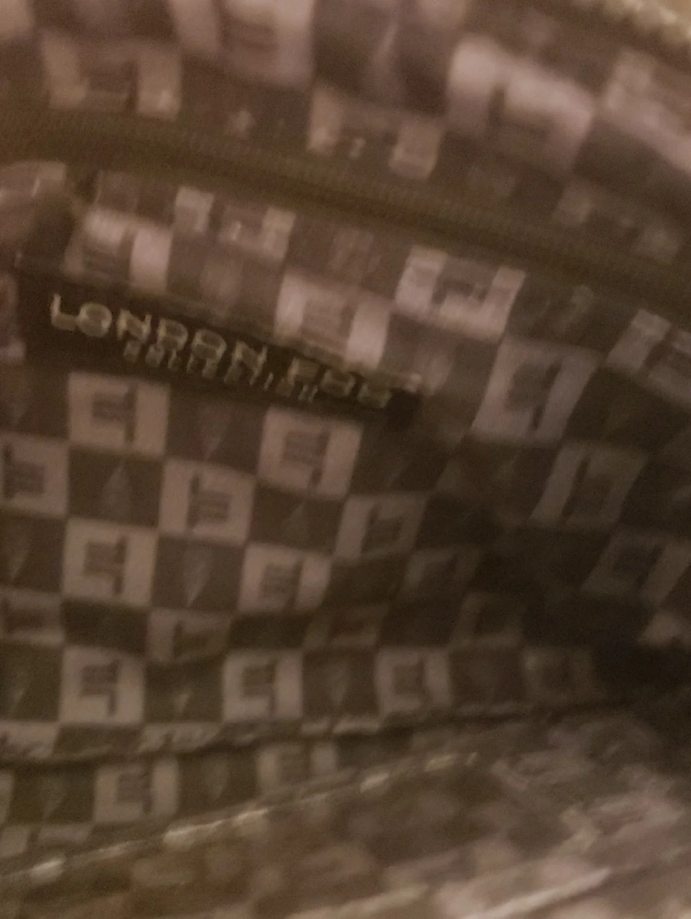 London Fog quilted cosmetic