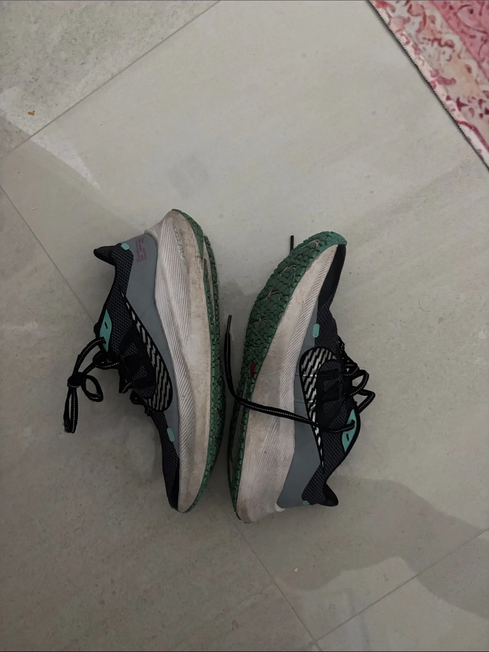Nike Women's Black Running Shoes with Teal and Pink Accents