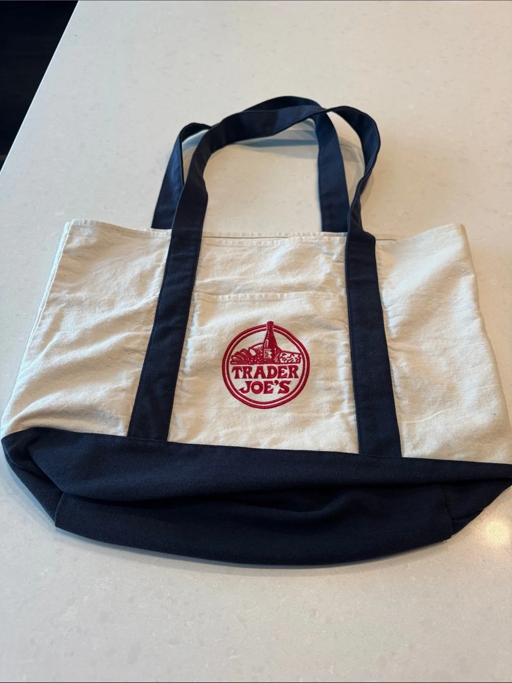 Trader Joe's Canvas Tote Bag in Cream and Navy black embroidered logo