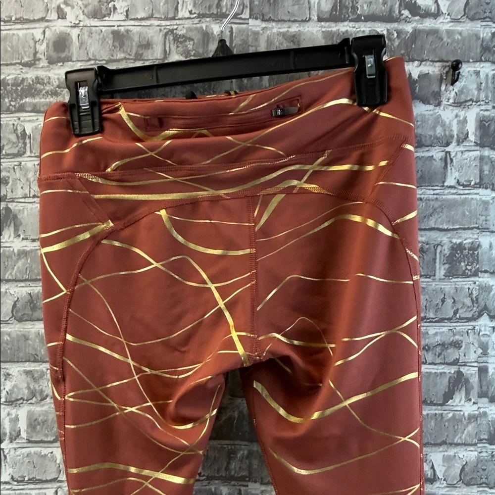 Nike running Copper and Gold Patterned Leggings‎