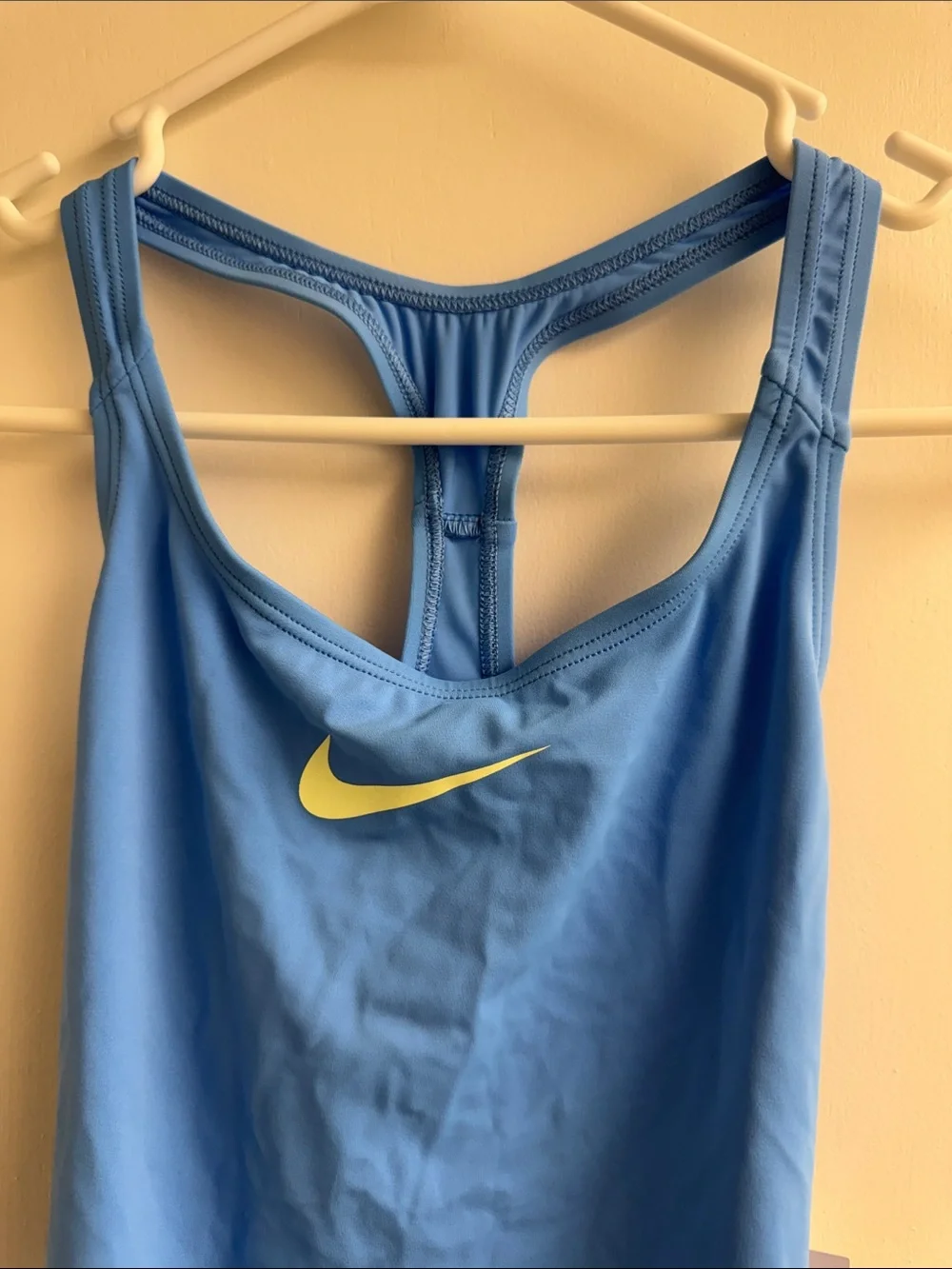 NWT Nike Blue Girls' One-Piece racer back Swimsuit with yellow Swoosh