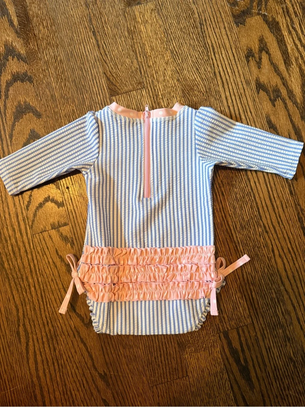 Ruffle Butts Blue and White Striped One-Piece with Pink Trim