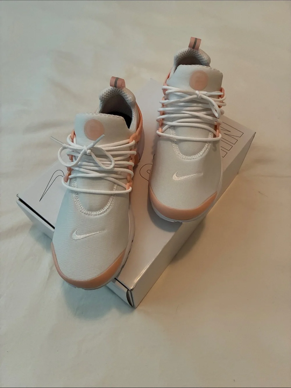 Nike Women’s White and Light Pink Low-Top Sneakers