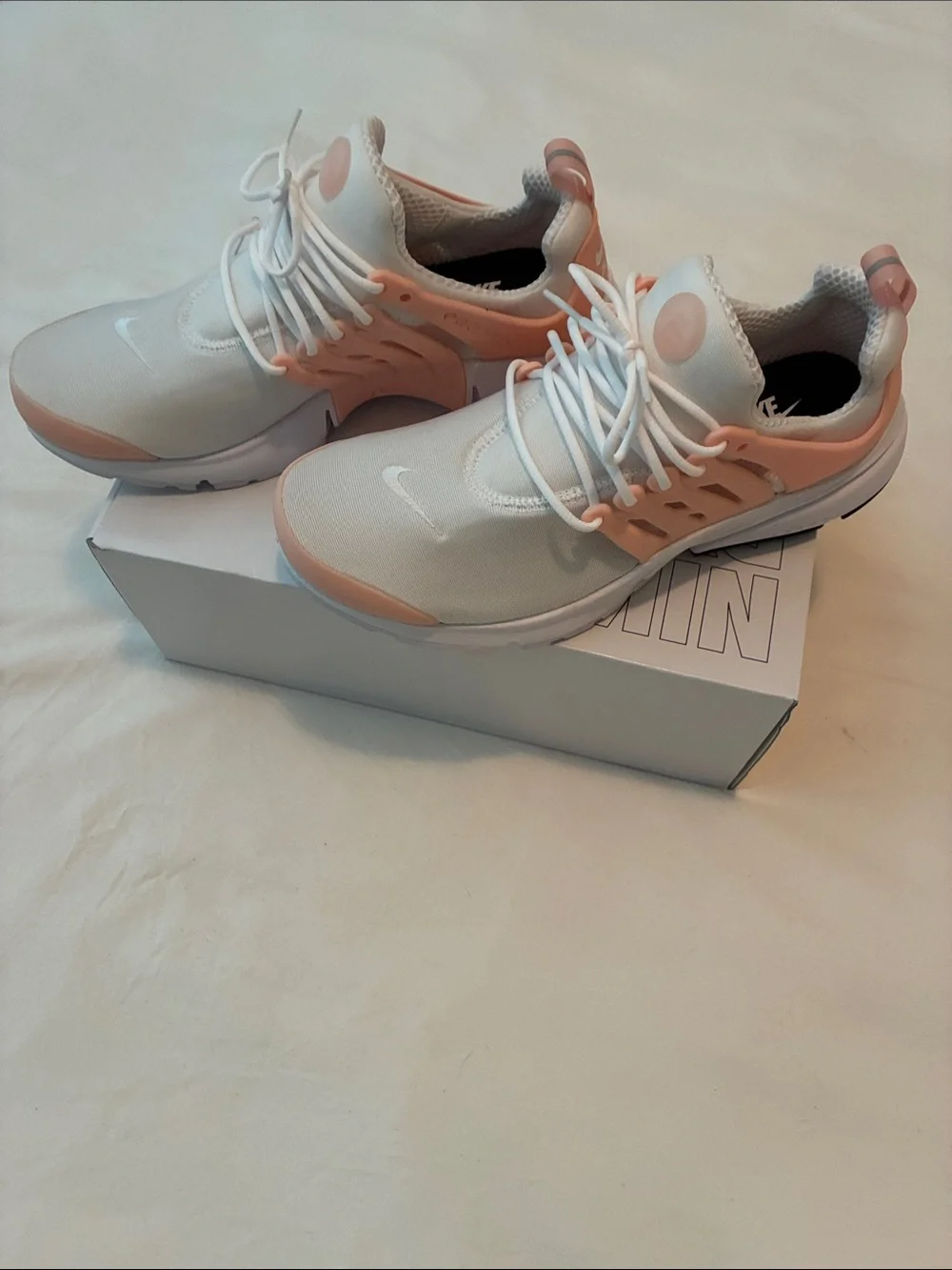 Nike Women’s White and Light Pink Low-Top Sneakers