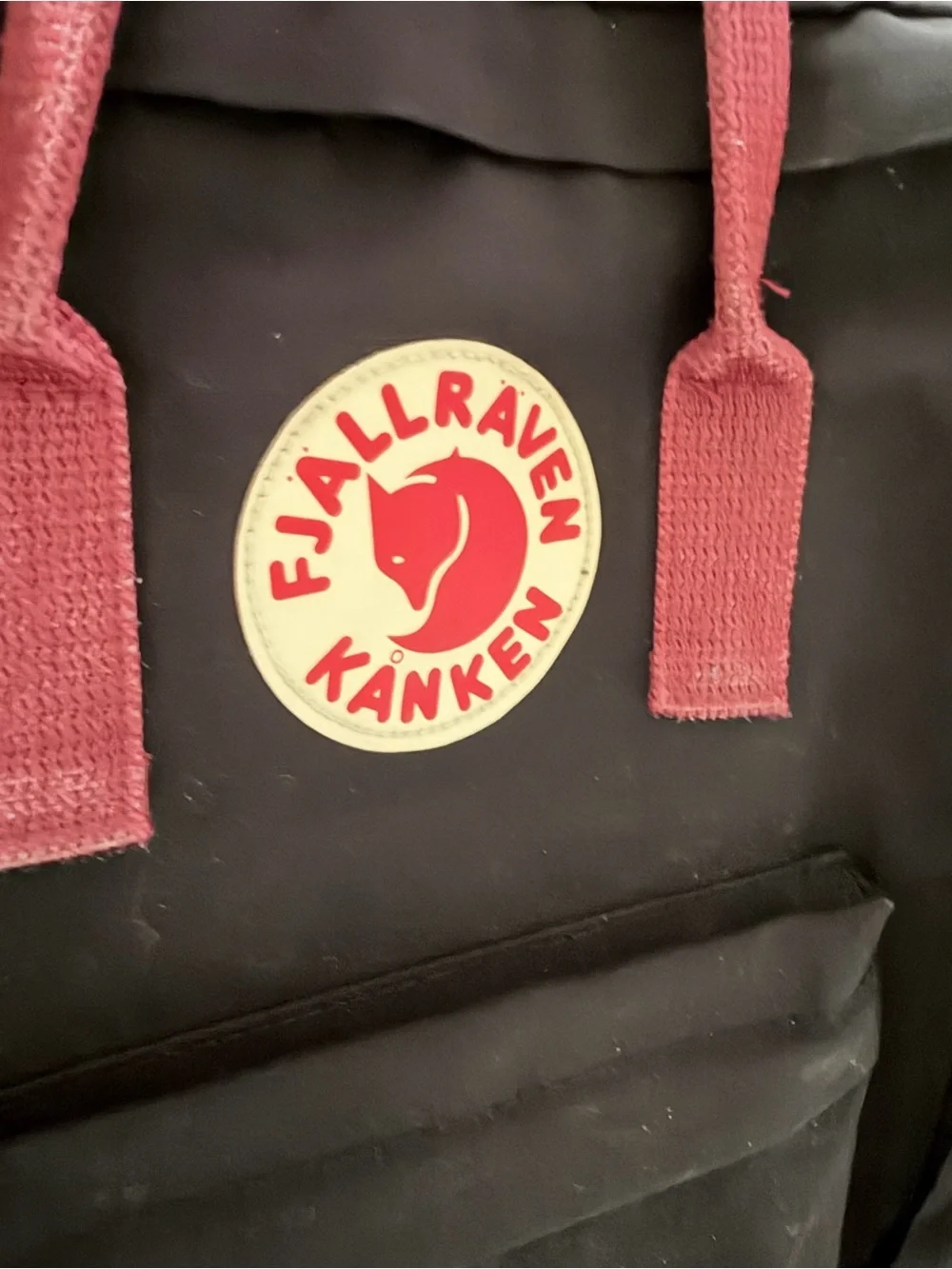 Fjallraven Kanken Black Backpack with Red Accents
