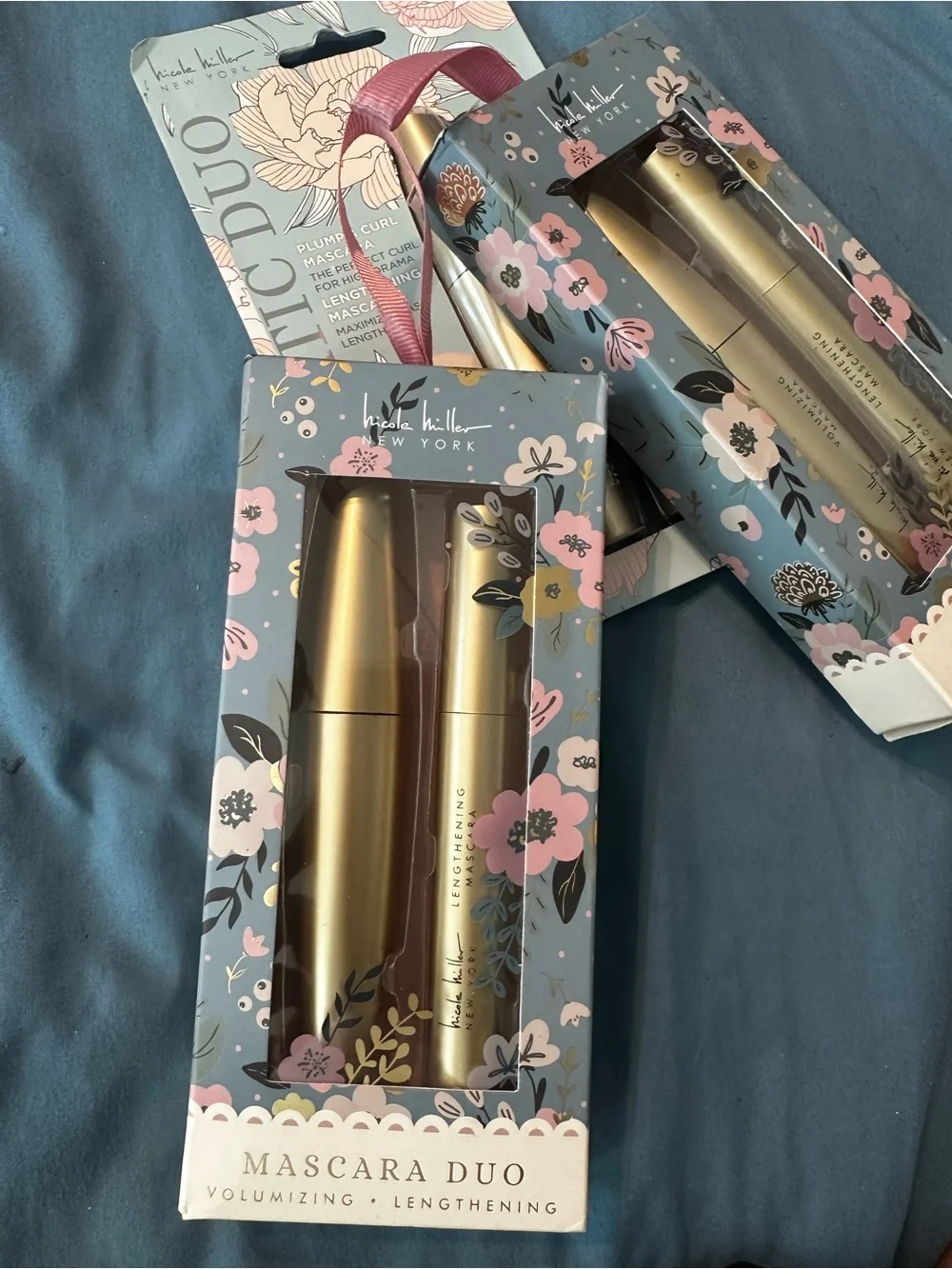 Nicole Miller two gold
