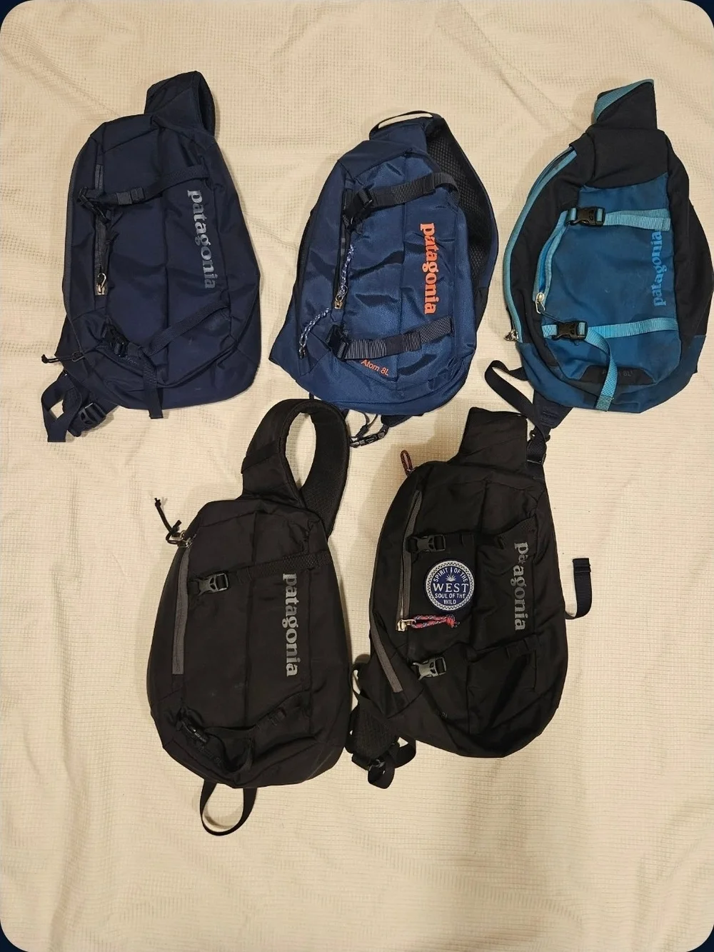 Patagonia Sling Pack Collection in Navy, Royal Blue, Teal, and Black