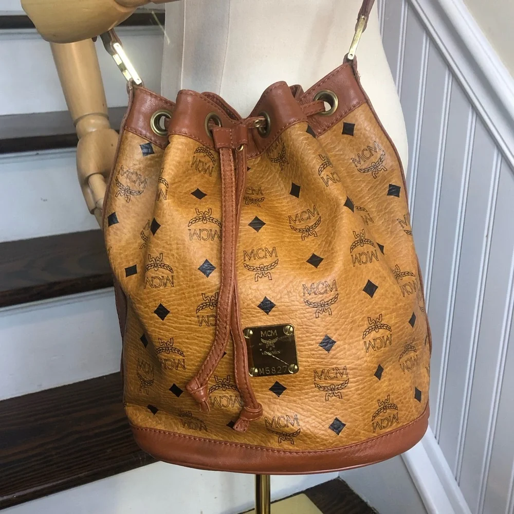 MCM Visetos Cognac Leather Monogram Bucket Drawstring Crossbody Bag EUC