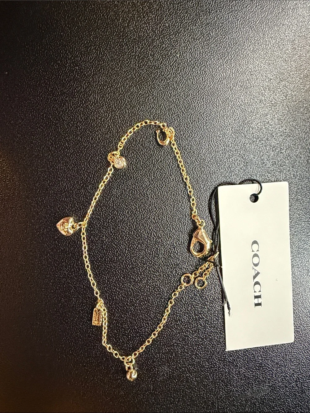 COACH Gold-Tone Heart Charm Bracelet