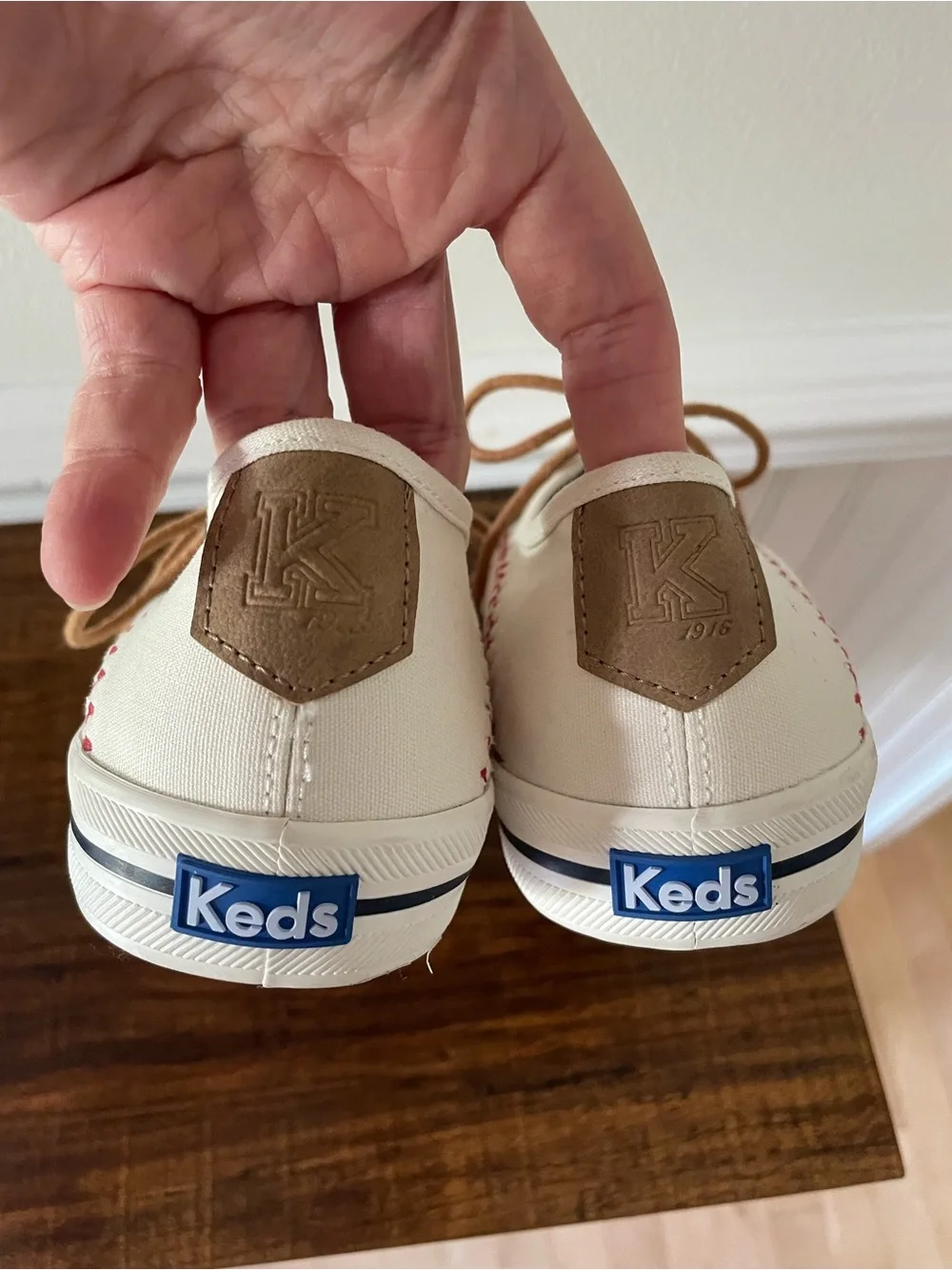 Keds White Canvas Sneakers with Red Stitching and Tan Laces