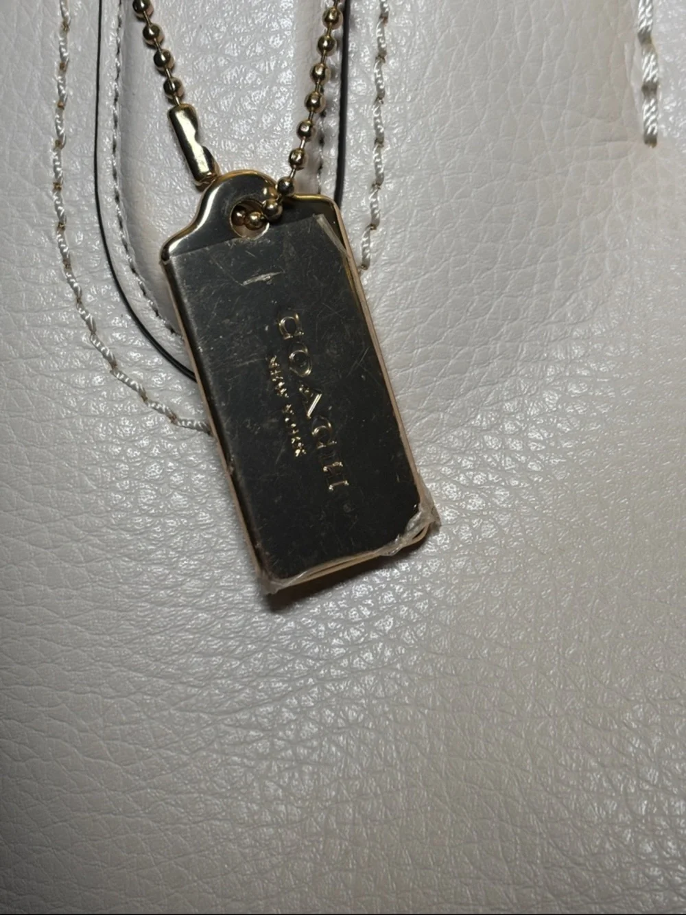 Coach plastic clean straps