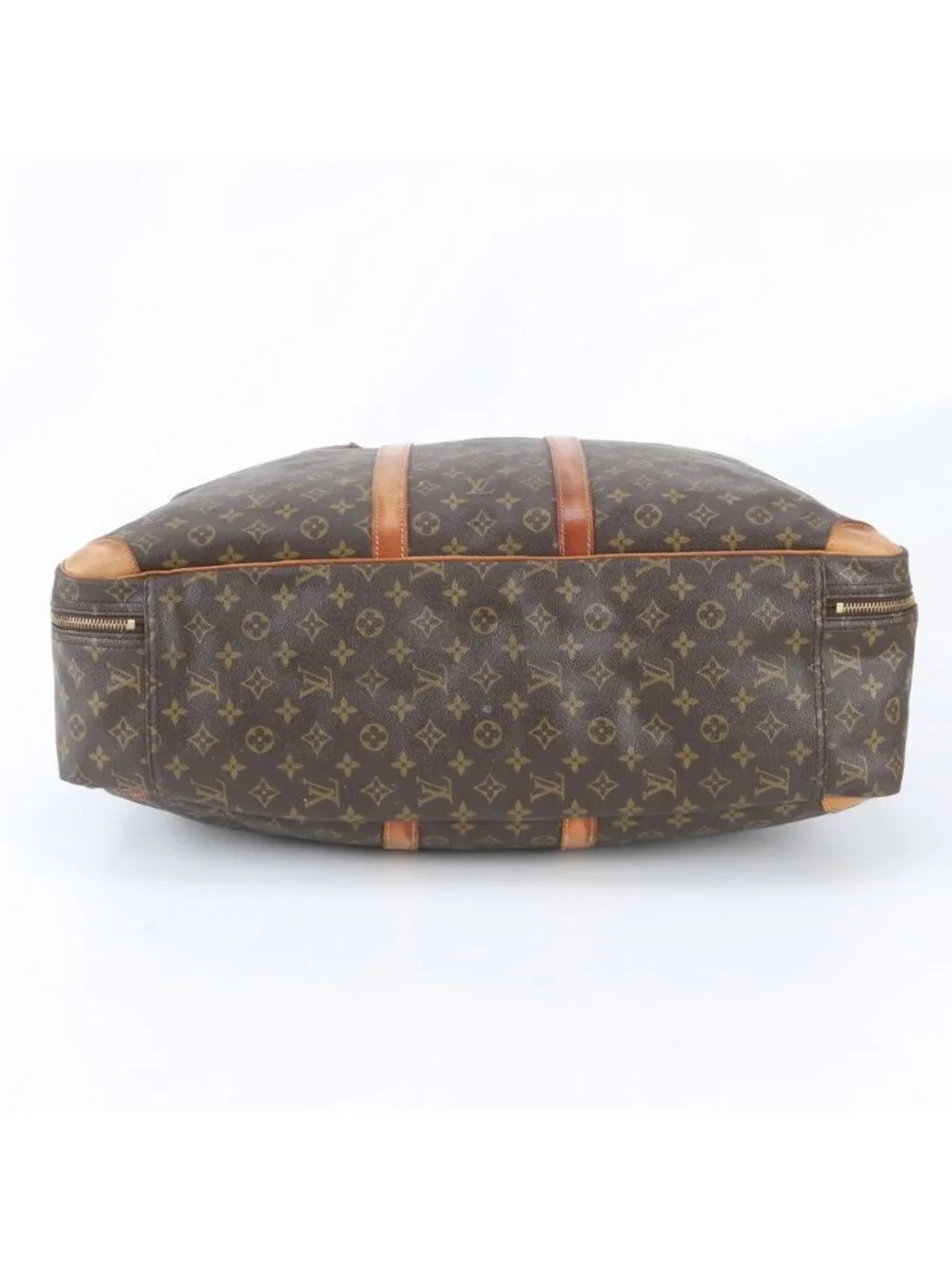 Louis Vuitton tote carefully