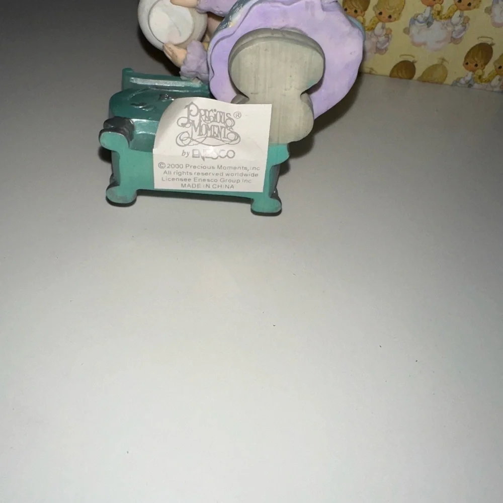 Precious Moments charming figurine