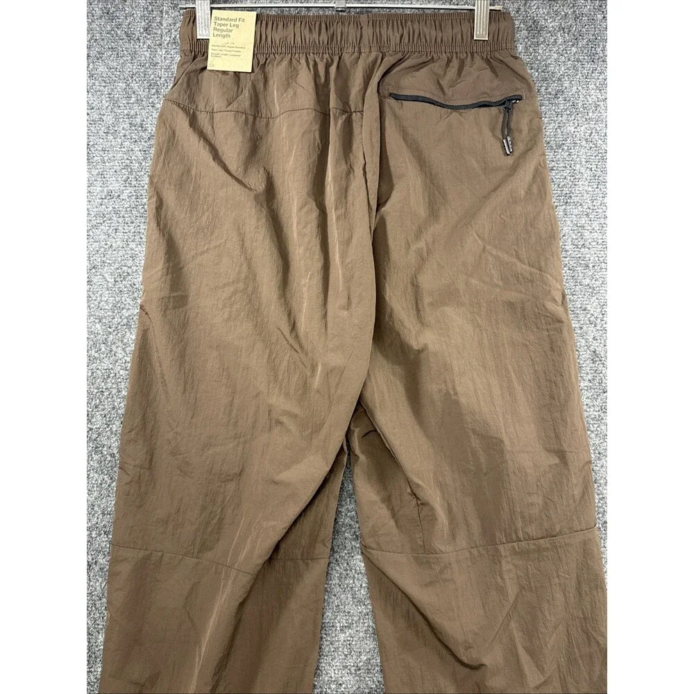 Nike Sportswear Woven Track Pants Brown Men’s Small NWT Move To Zero Joggers