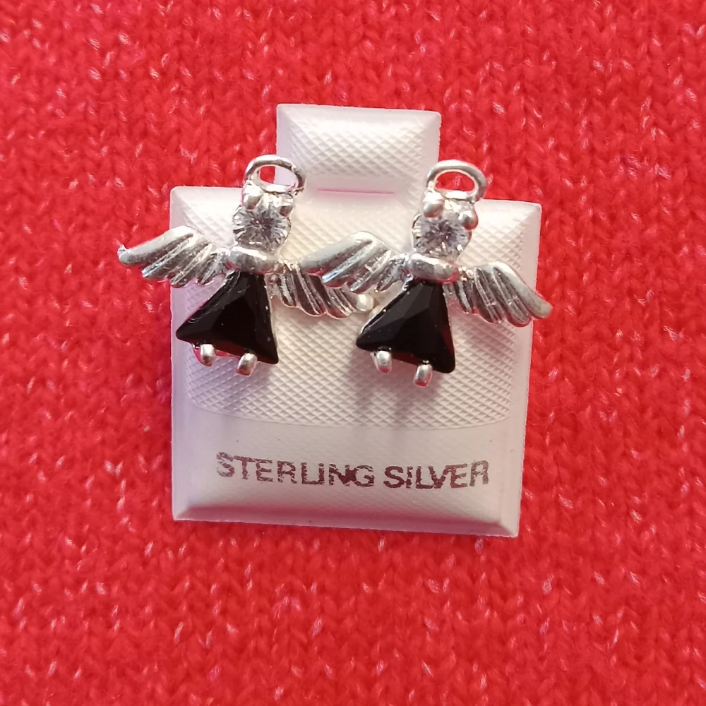 Sterling Silver with‎ zircon Angel post stud earrings.