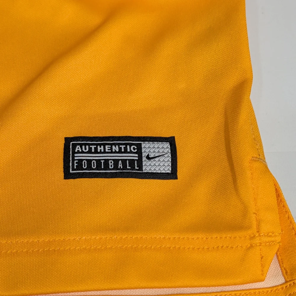 Nike bold yellow