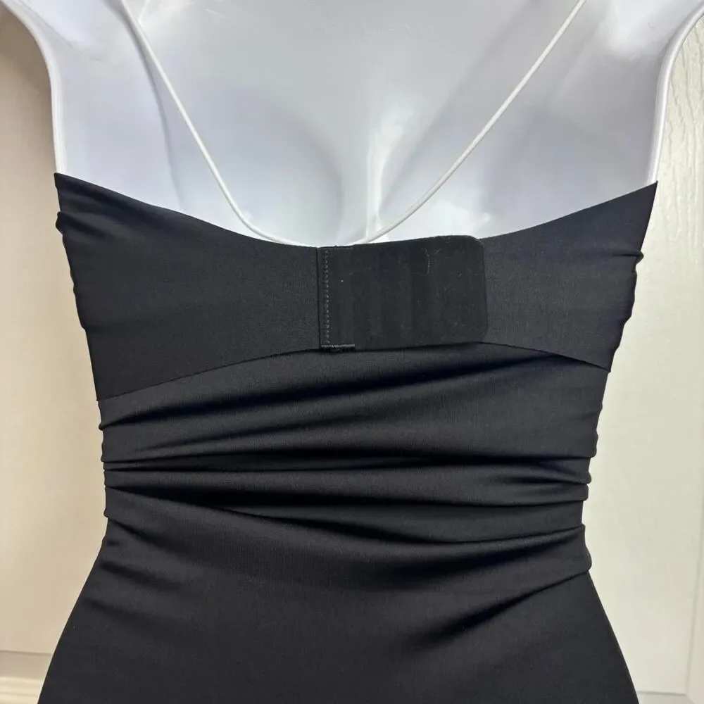 Source Unknown sleek black