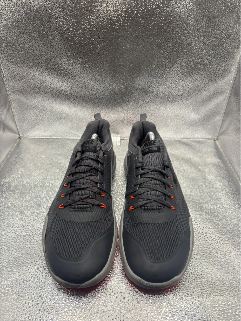 Nike legend trainer orange accents