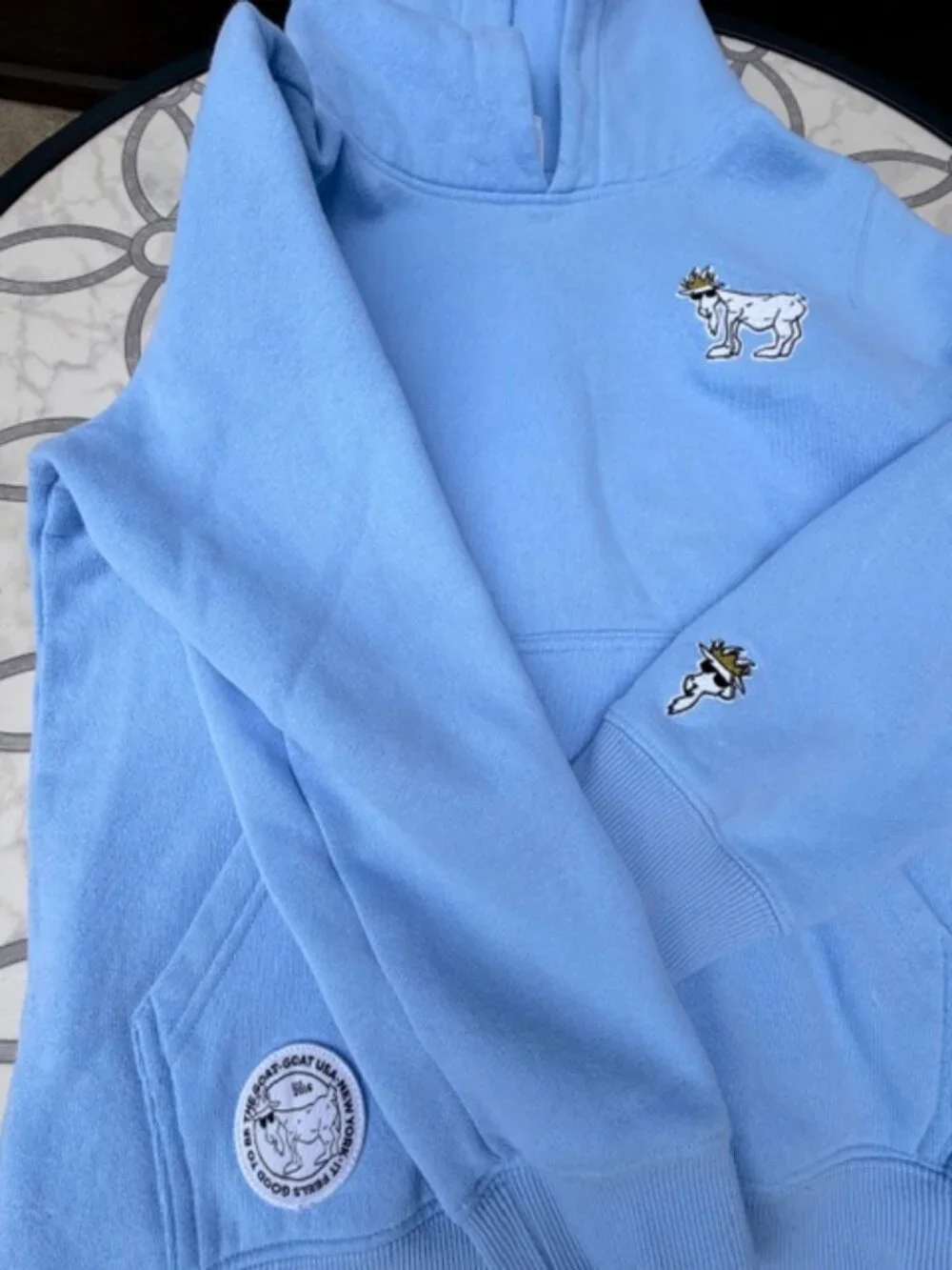 GOAT USA Pullover Hoodie is a stylish and comfortable sweatshirt. Unisex YOUTH L