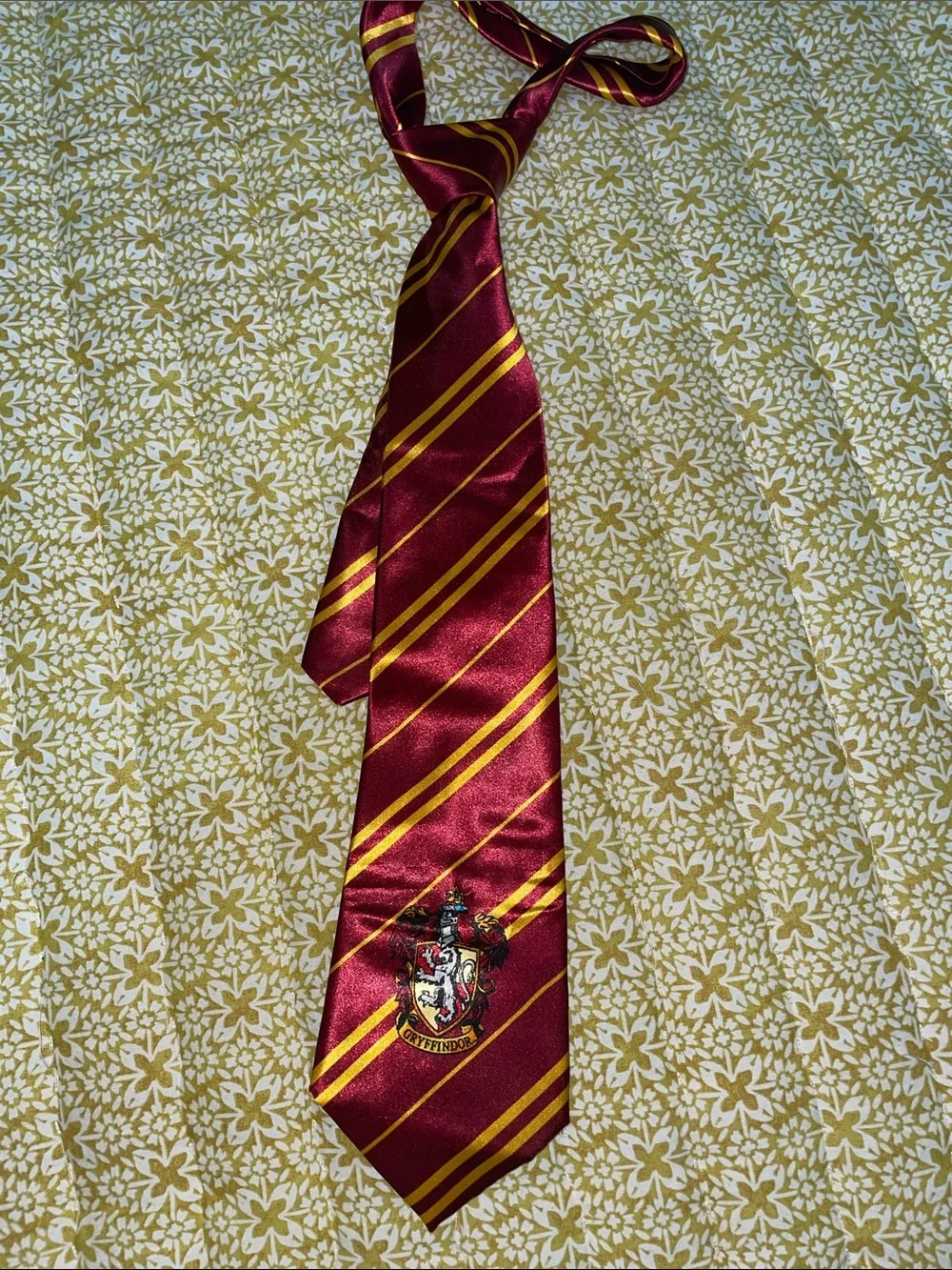 Burgundy and Gold Gryffindor Harry Potter tie.