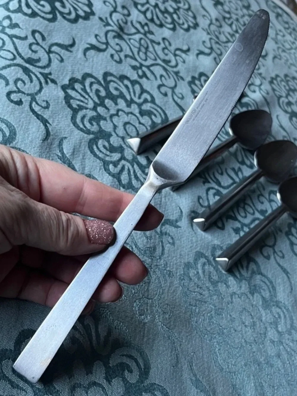 Hampton Silversmiths includes triangular
