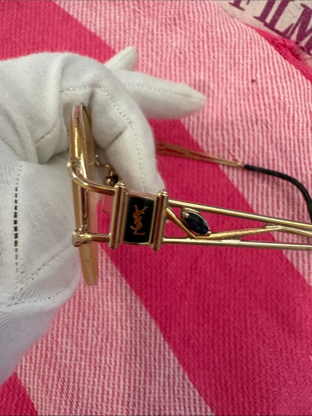 Yves Saint Laurent elegant gold