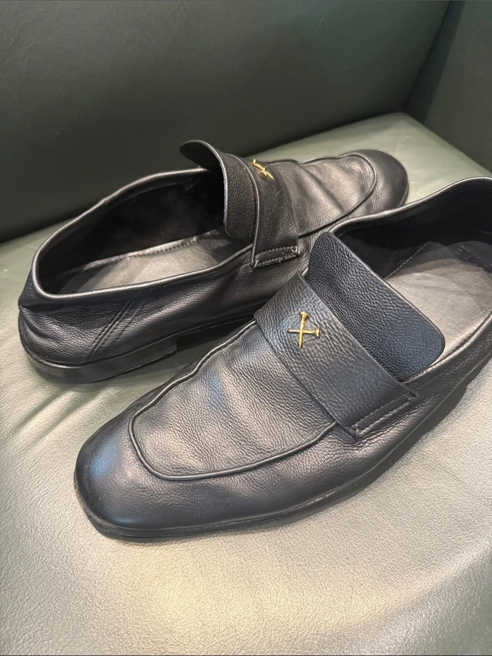 G/FORE Black Leather Slip-On Loafers with Gold Cross Accent