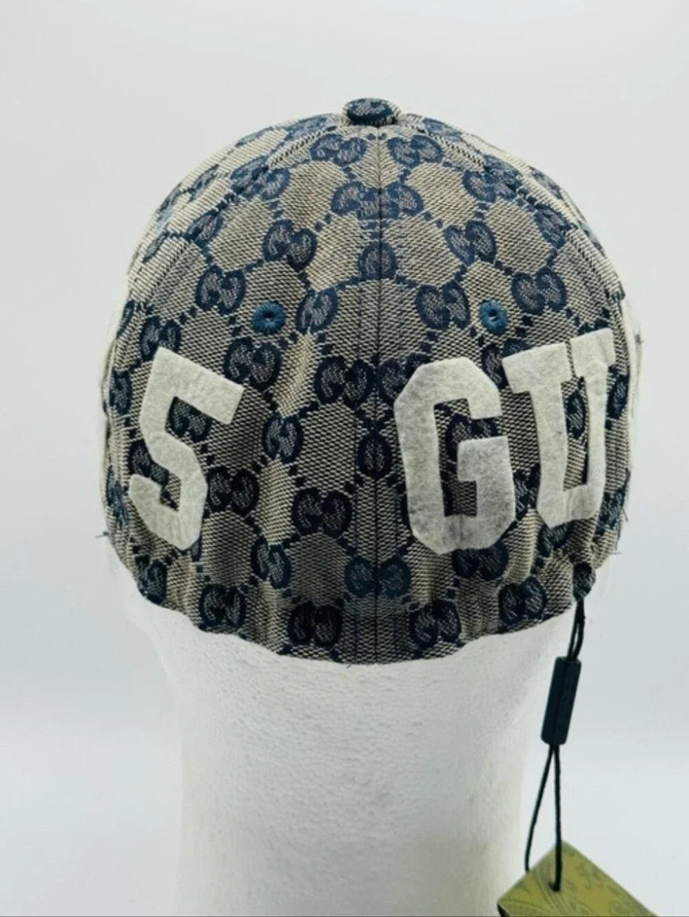 Gucci cap signature