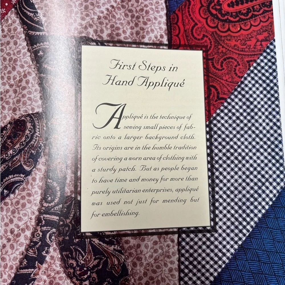 Red and Blue Log Cabin Quilt with Intricate Stitching